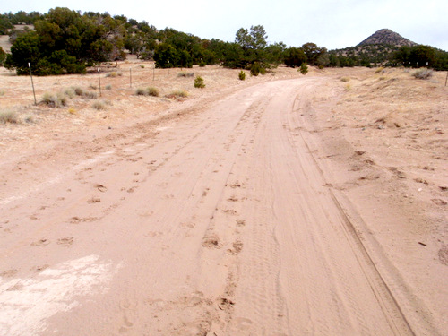 The places with more sand form the softer valleys of the road.